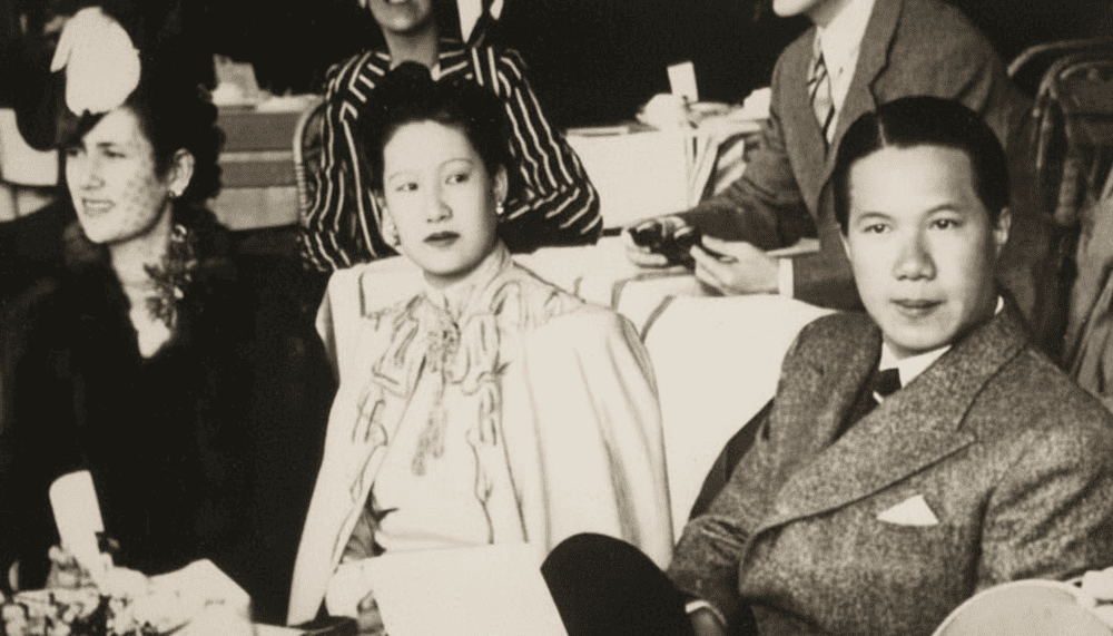 Image capturing the presence of King Bao Dai and Queen Nam Phuong at an event